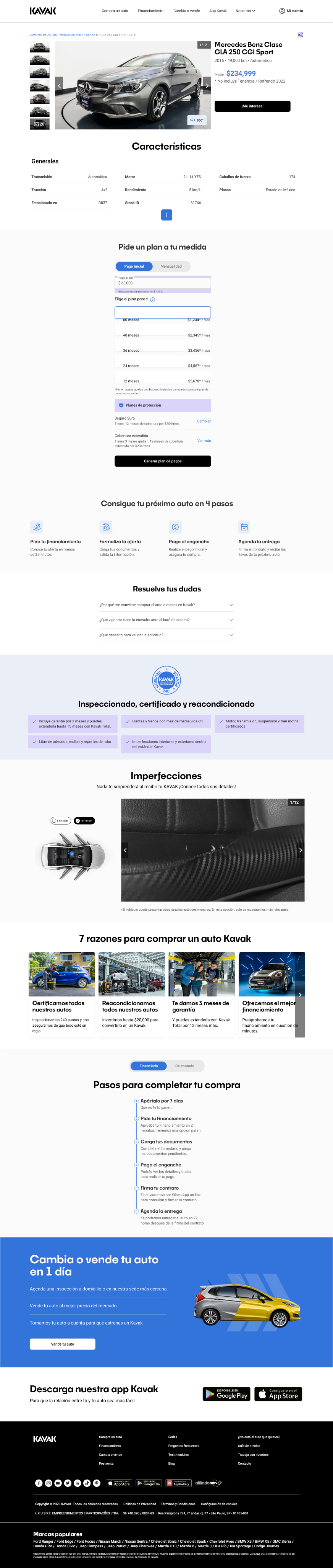 two people sitting on a ledge talking